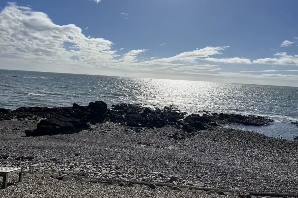 Sky, sea, horizon and shore seen from the settee at the Johnshaven retreat